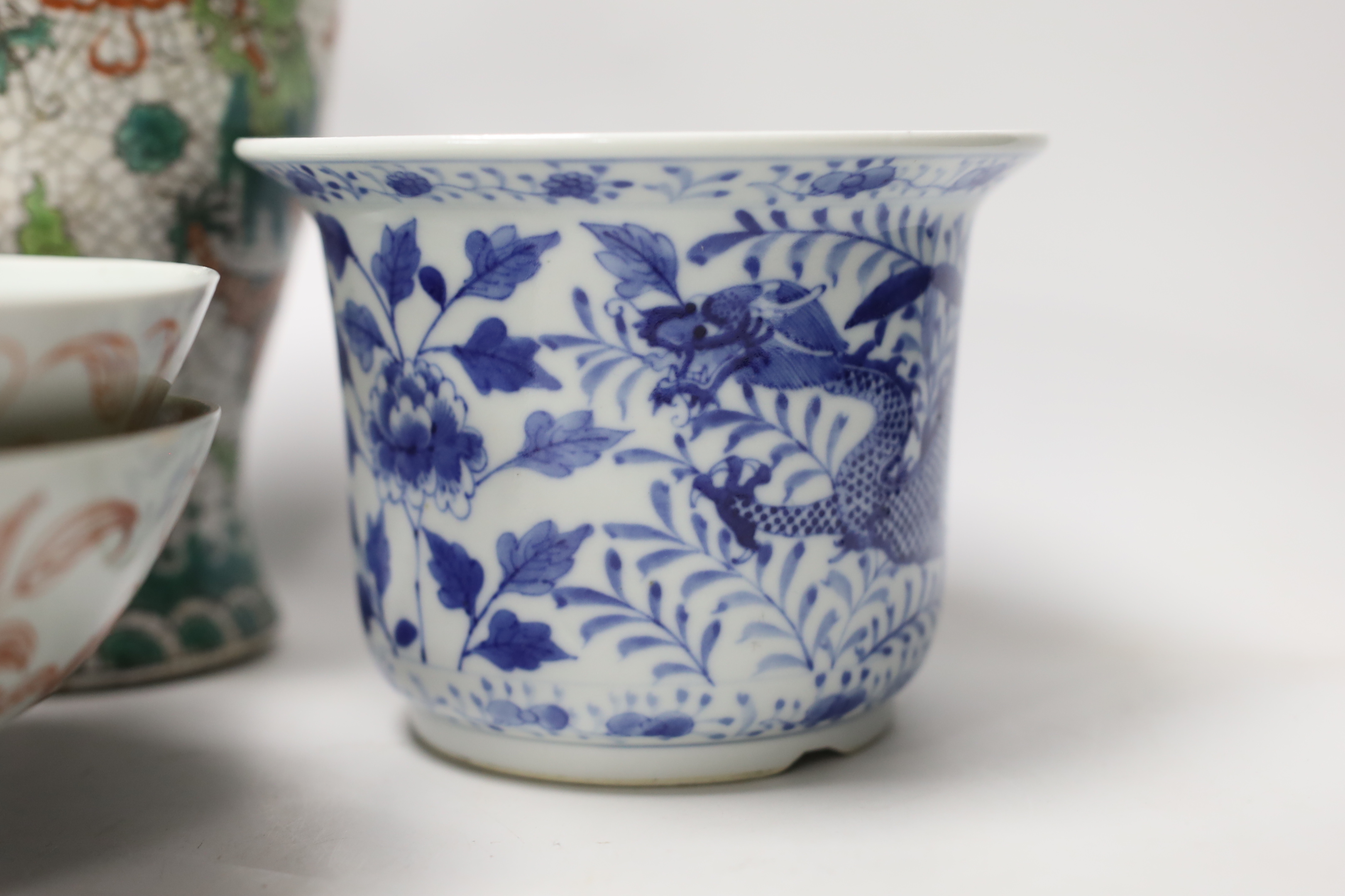 Two Chinese bowls, two blue and white dragon planters and a crackleware vase, tallest 22.5cm